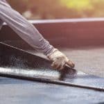 Roofer Working On Roof