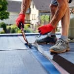Roofer Working On Roof