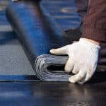 Roofer Laying Material